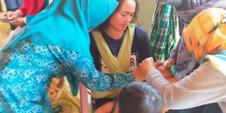 Pos Pelayanan Terpadu (POSYANDU) di Desa Purwadadi Barat Adakan Pekan Imunisasi Nasional